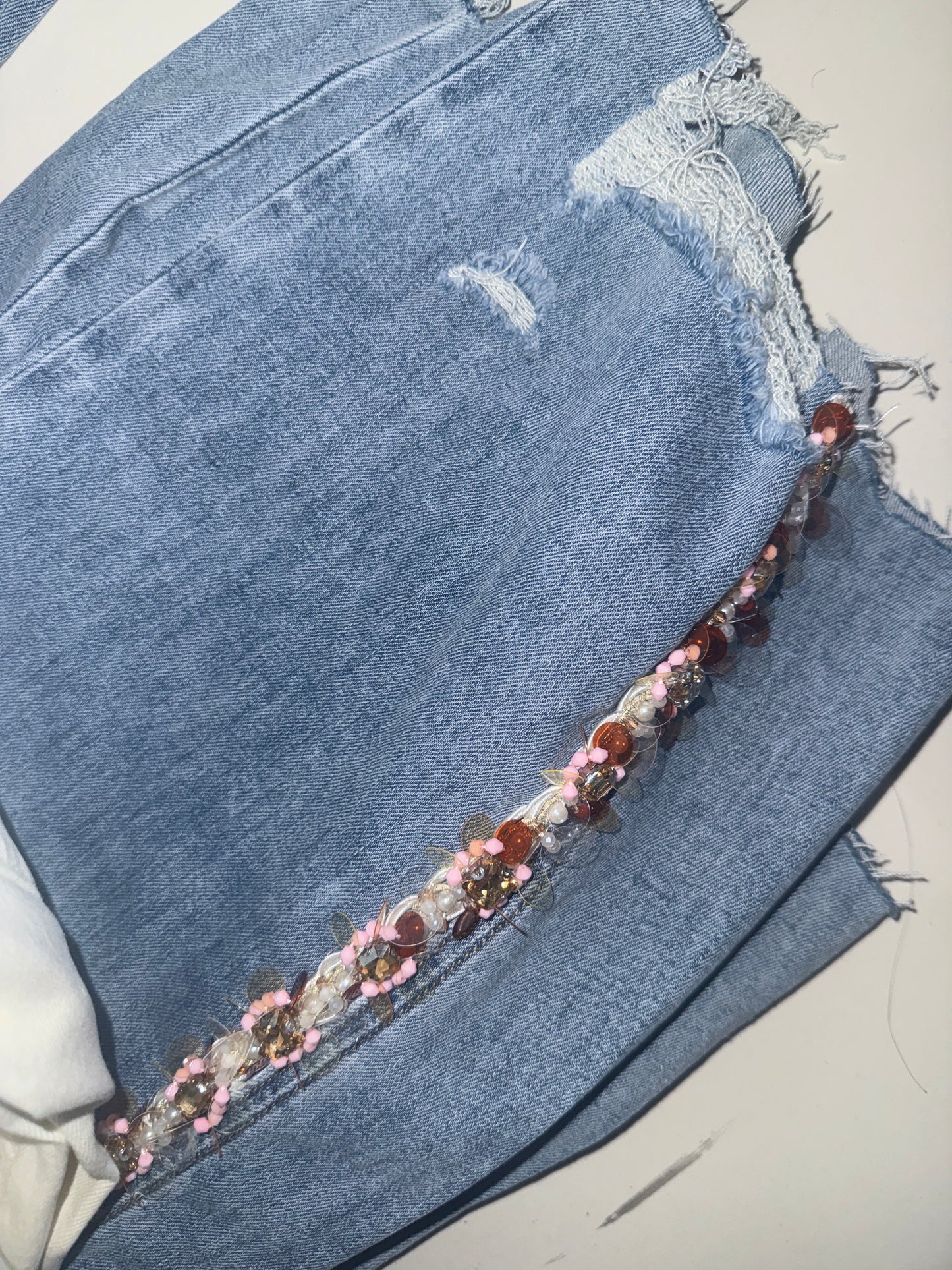 Jeans pedrería lateral