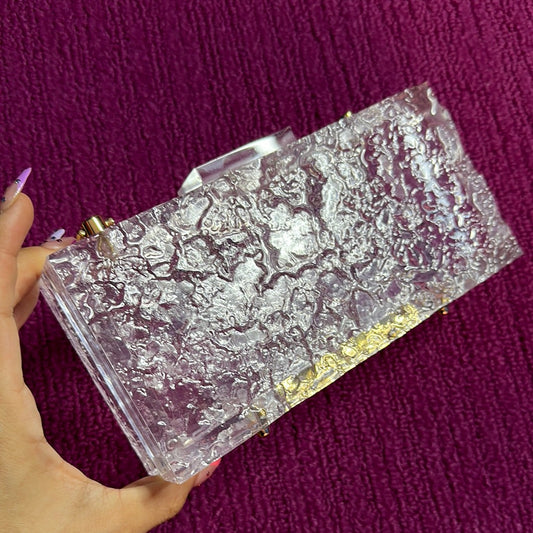 Clutch transparente